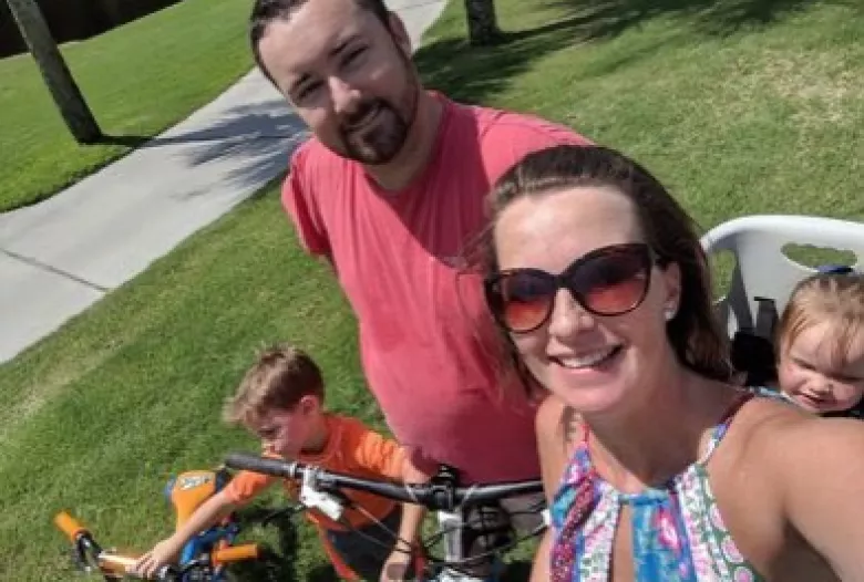 Happy family on bikes