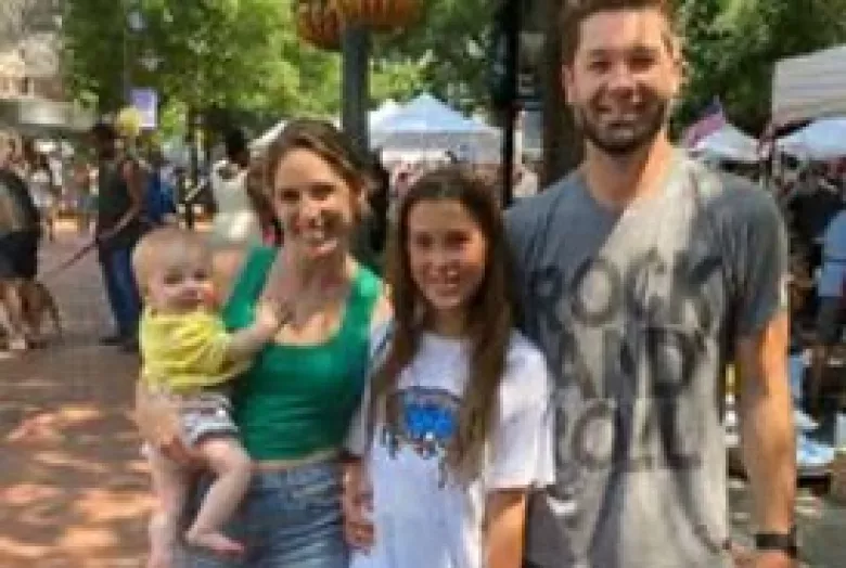 Young family at a street fair